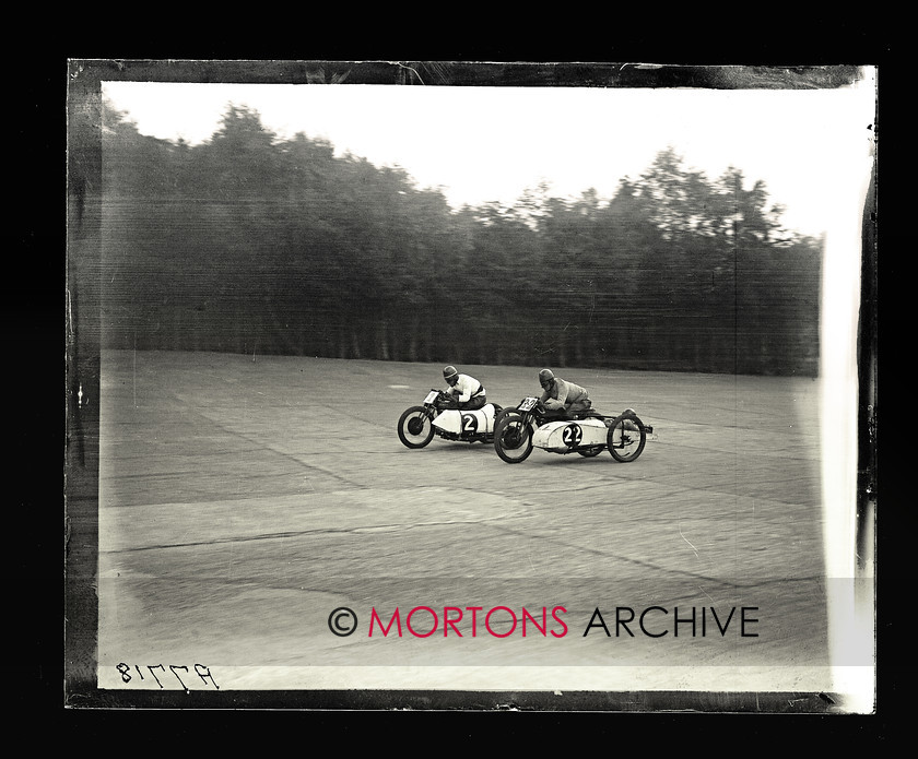 062 SFTP 06 
 Thrills, spills and new world records Brooklands, 1927. Tommy Bullus (New Hudson) nearest the camera. Its possibly like-mounted Le Vack behind. 
 Keywords: 2014, Glass plates, July, Mortons Archive, Mortons Media Group Ltd, Straight from the plate, The Classic MotorCycle
